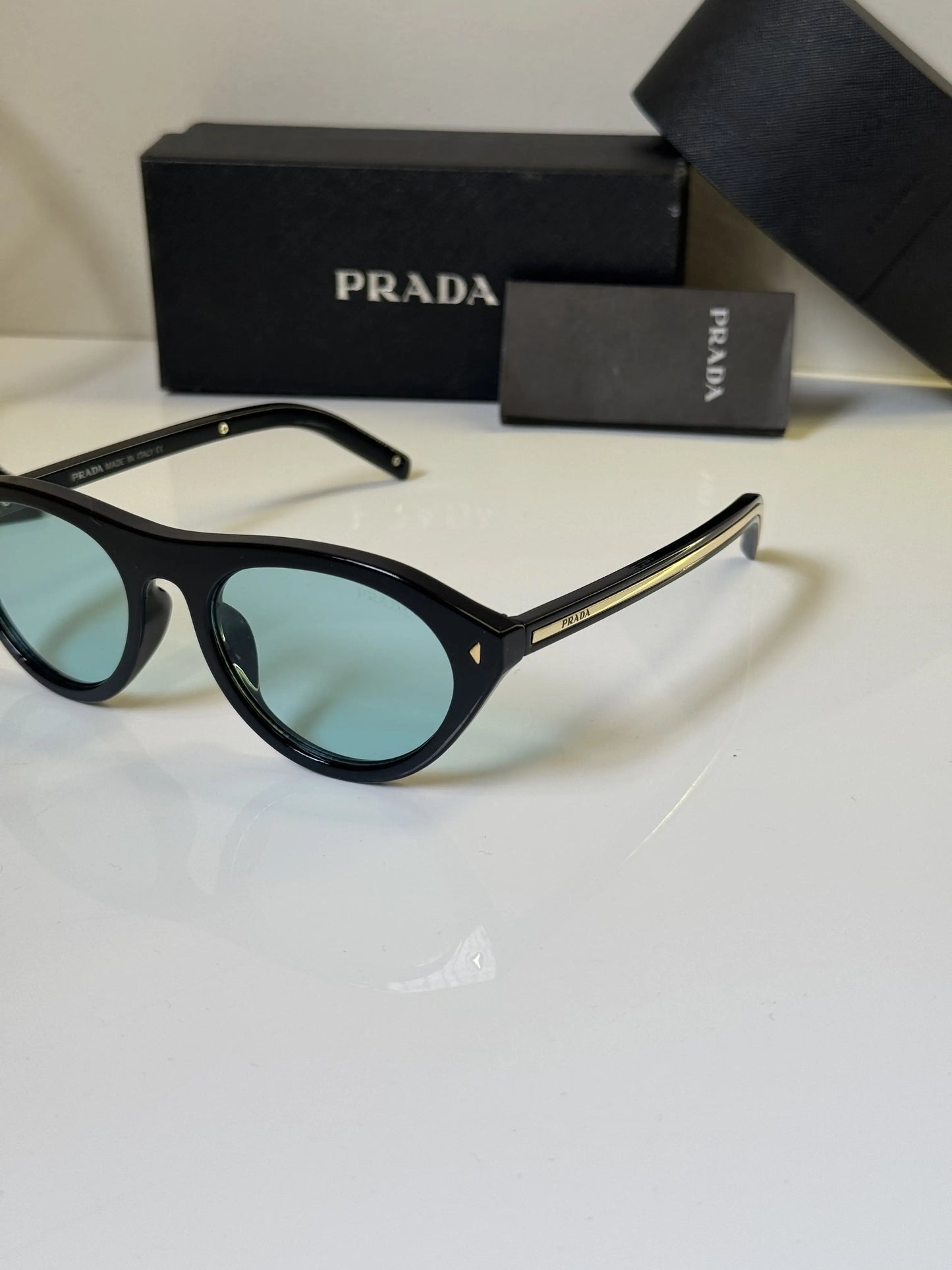 PRADA SUNGLASSES
